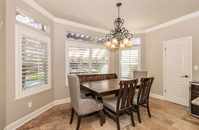 dining space featuring crown molding, beverage cooler, and an inviting chandelier