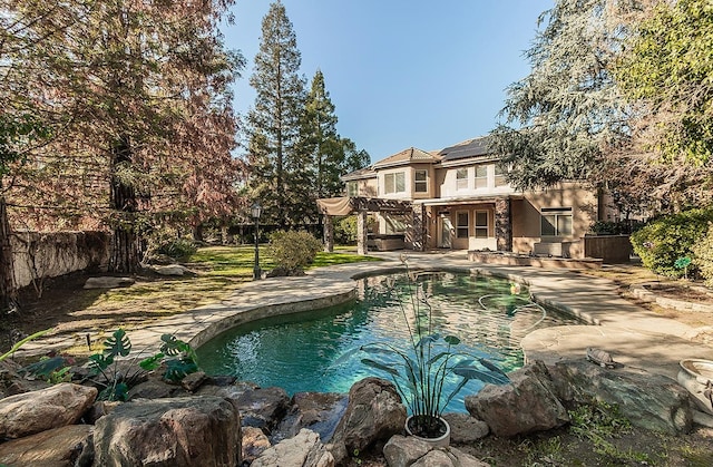 view of pool with a pergola and a patio area