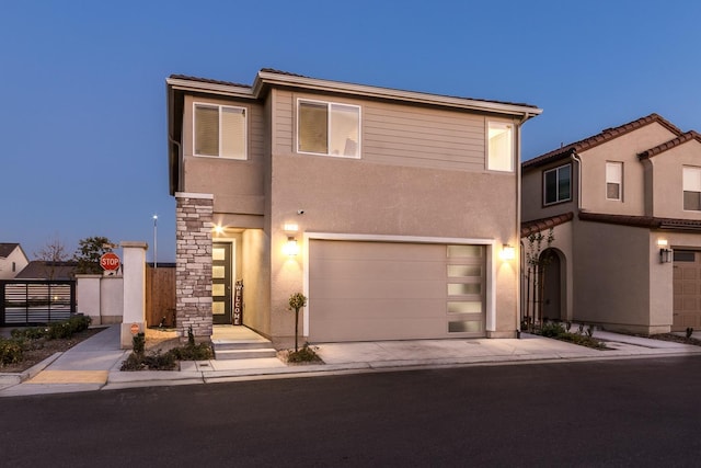 view of front of property featuring a garage