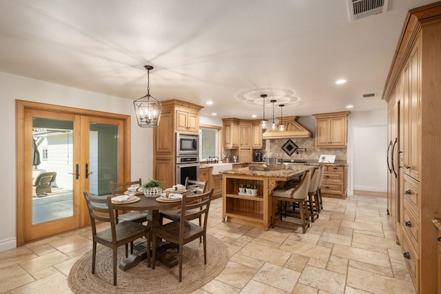 dining room featuring french doors