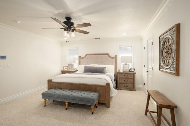 carpeted bedroom featuring ornamental molding and ceiling fan