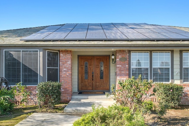 property entrance with solar panels