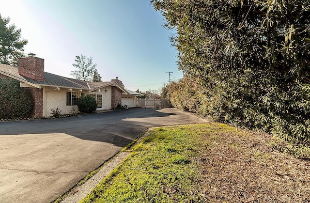 view of property exterior featuring a garage