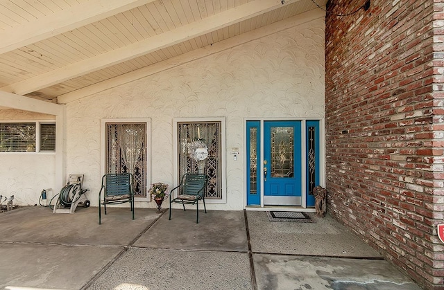 6779 N Woodson Ave, Fresno, CA 93711 - property entrance featuring stucco siding