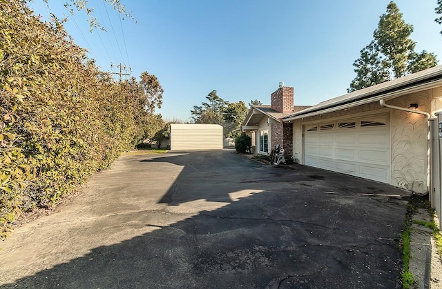 exterior space featuring a garage