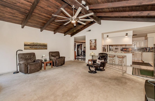 6779 N Woodson Ave, Fresno, CA 93711 - carpeted living area with a ceiling fan, a wood ceiling with exposed beams, and high vaulted ceiling