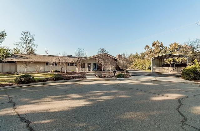 view of front of home with a carport