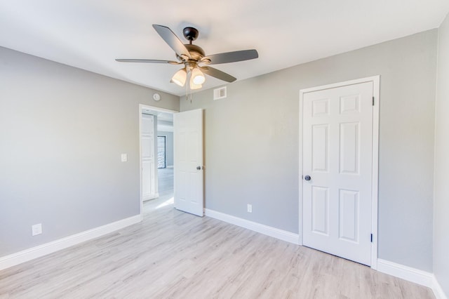 unfurnished bedroom featuring ceiling fan and light hardwood / wood-style flooring