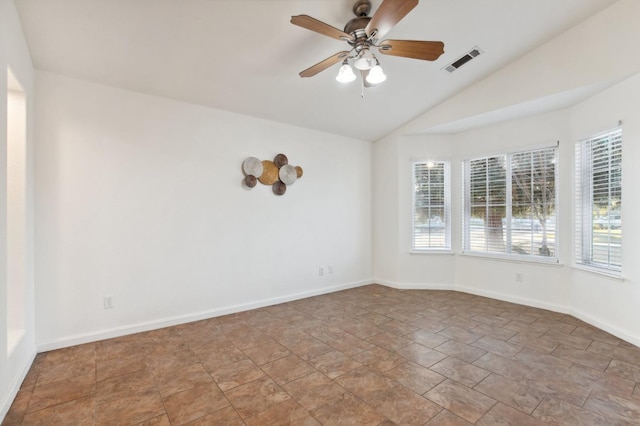 spare room with lofted ceiling and ceiling fan