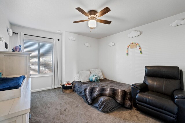 carpeted bedroom featuring ceiling fan