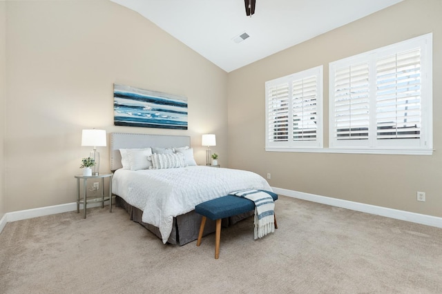 carpeted bedroom featuring ceiling fan and lofted ceiling