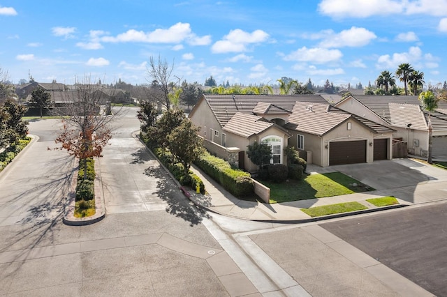 single story home featuring a garage