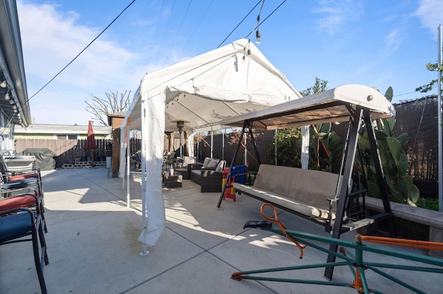 view of patio / terrace featuring a gazebo and an outdoor hangout area