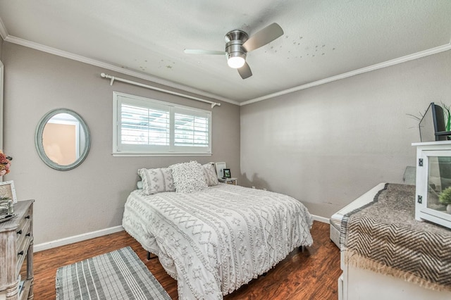 bedroom with baseboards, ornamental molding, dark wood finished floors, and a ceiling fan