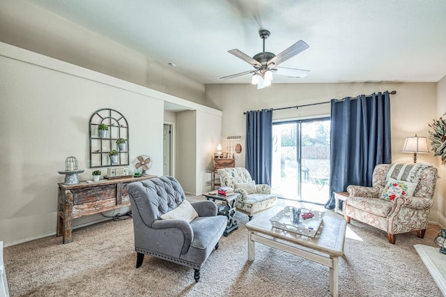 living area featuring carpet floors, a ceiling fan, and lofted ceiling