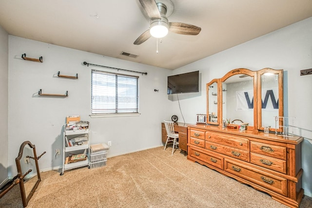 bedroom with carpet, visible vents, ceiling fan, and baseboards