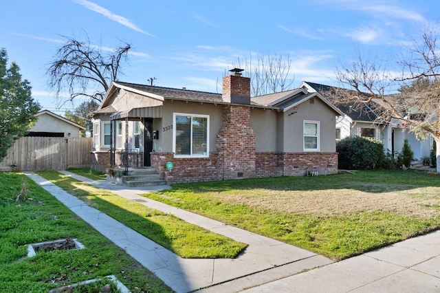 view of front facade with a front yard