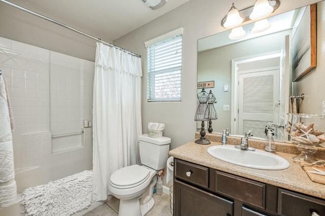 full bathroom featuring tile patterned flooring, vanity, shower / bath combo with shower curtain, and toilet