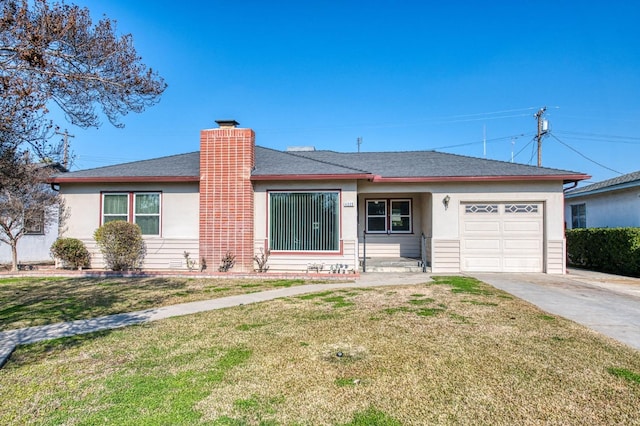 ranch-style home with a garage and a front lawn