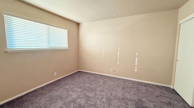 1859 S Karen Ave, Fresno, CA 93727 - empty room featuring carpet floors and baseboards