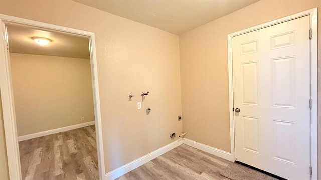 1859 S Karen Ave, Fresno, CA 93727 - laundry area with electric dryer hookup, light wood-style flooring, baseboards, and hookup for a washing machine