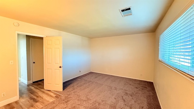 1859 S Karen Ave, Fresno, CA 93727 - carpeted empty room featuring a smoke detector and baseboards
