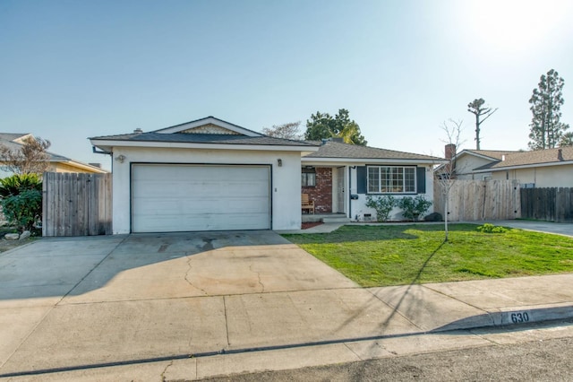 ranch-style home featuring a garage and a front yard