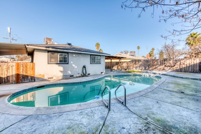 view of pool featuring a patio area