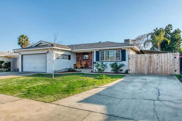 single story home featuring a garage and a front yard