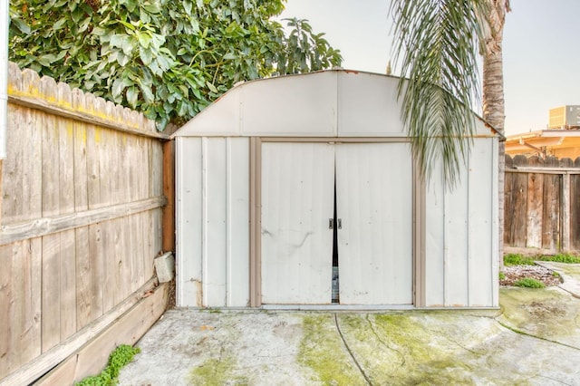 view of outbuilding with cooling unit