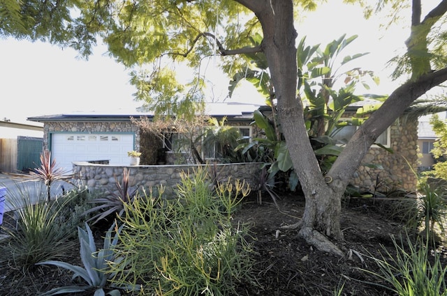 view of home's exterior with a garage