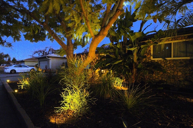 view of property exterior with an attached garage