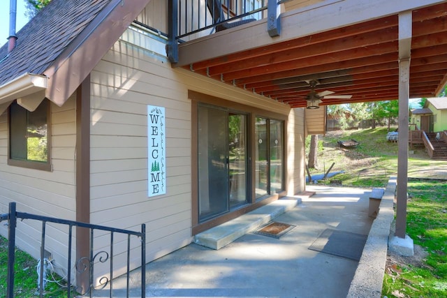 view of patio featuring a balcony and ceiling fan