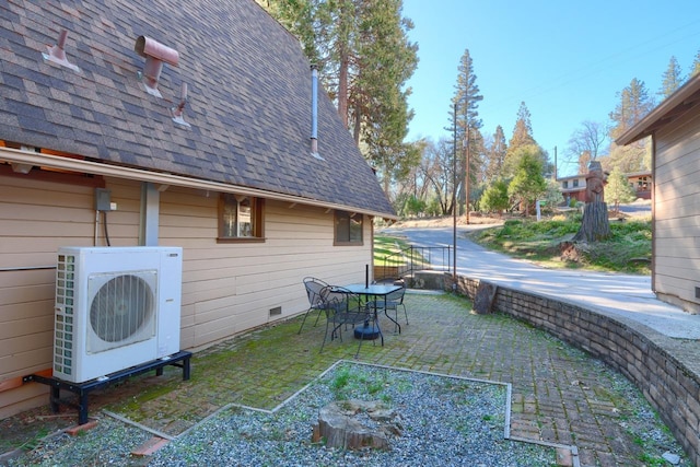 view of yard featuring ac unit and a patio area