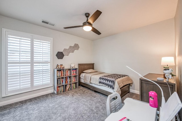 carpeted bedroom with ceiling fan