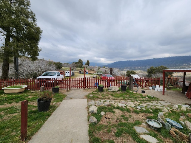 view of yard with a mountain view