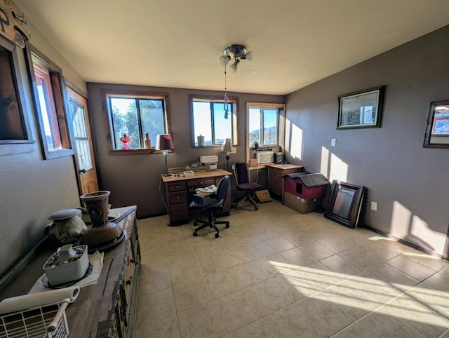 office space featuring light tile patterned flooring