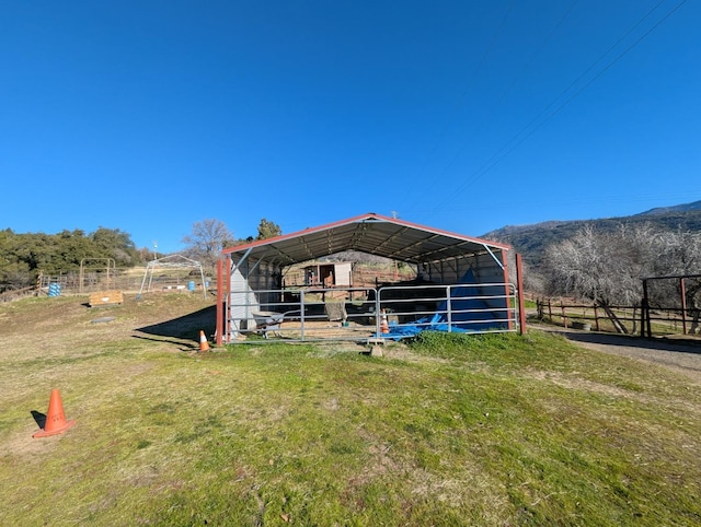 view of outdoor structure featuring a rural view