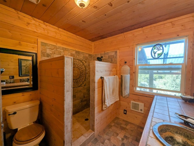 bathroom with wood ceiling, walk in shower, toilet, and wood walls