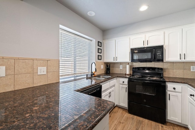 kitchen featuring white cabinetry, sink, light hardwood / wood-style flooring, and black appliances