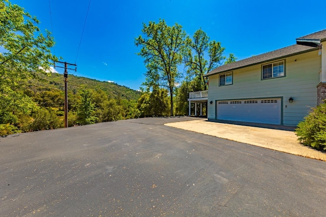 view of home's exterior with a garage