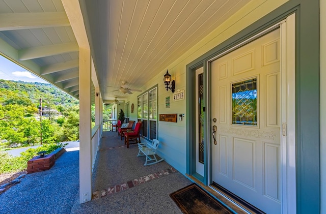 entrance to property with covered porch