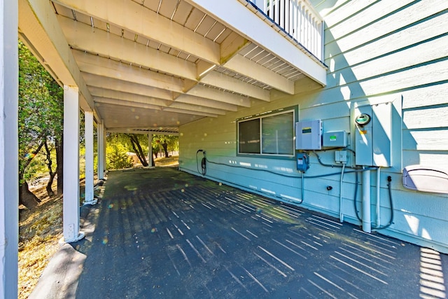 deck featuring an attached carport