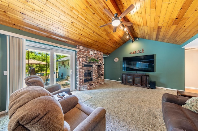 living room with baseboards, lofted ceiling with beams, wooden ceiling, carpet, and a fireplace