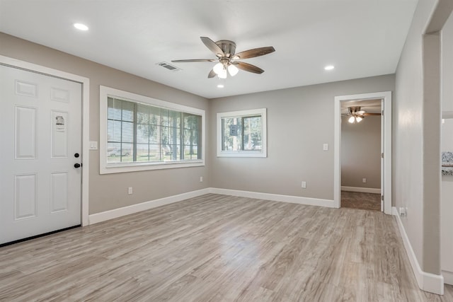 entryway featuring ceiling fan and light hardwood / wood-style floors