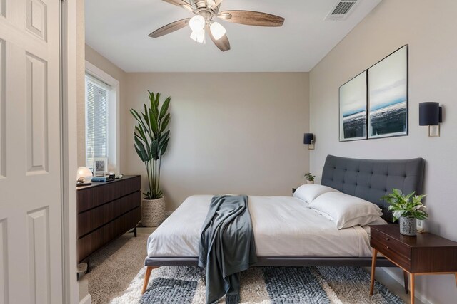 bedroom featuring carpet and ceiling fan