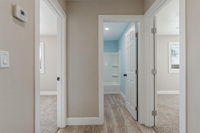 hall featuring light wood-type flooring