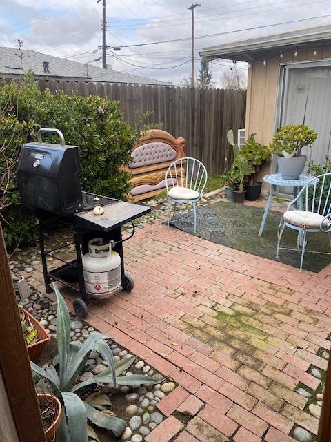 view of patio with fence