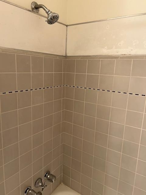 full bathroom with  shower combination