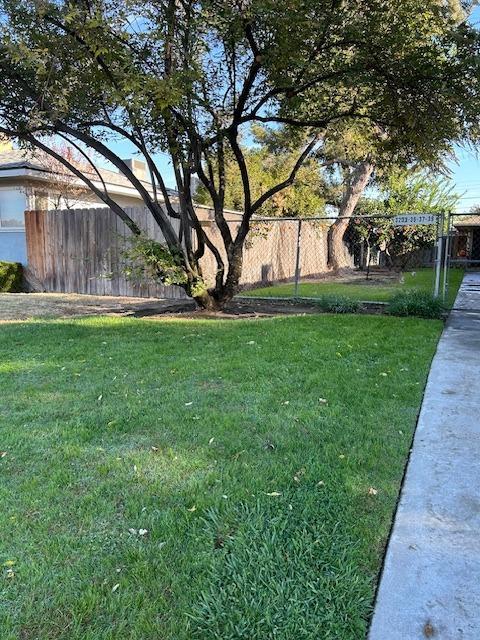 view of yard with fence